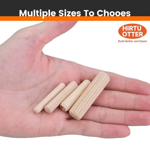 Hand holding 50 Piece Hardwood Dowel Pins 1/2 Inch By 2 Inch Kiln Dried Schima Superba Fluted And Beveled for woodworking projects