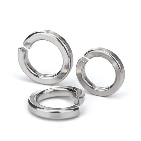 Three stainless steel split lock washers, 1/2 in ID, 0.869 in OD, 304 stainless steel, front view