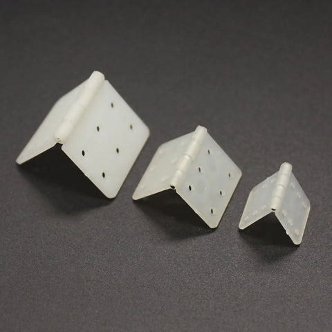 Three Nylon Hinges For RC Airplanes skrnrhrery Three Sizes, medium, small, large, showing square loose leaf design for model aircrafts