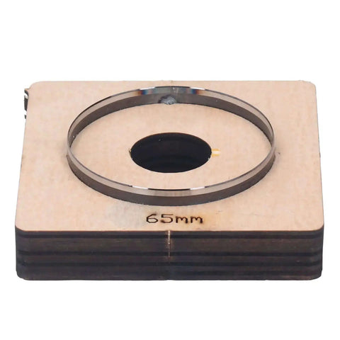 65mm Circular Leather Hole Punch Die For DIY Leatherworking Projects And Card Holders Purses Belts And More With Clean Shiny Edges And Pro Grade Durable Alloy Steel Construction Your Go To Tool For Precise Holes on wooden base