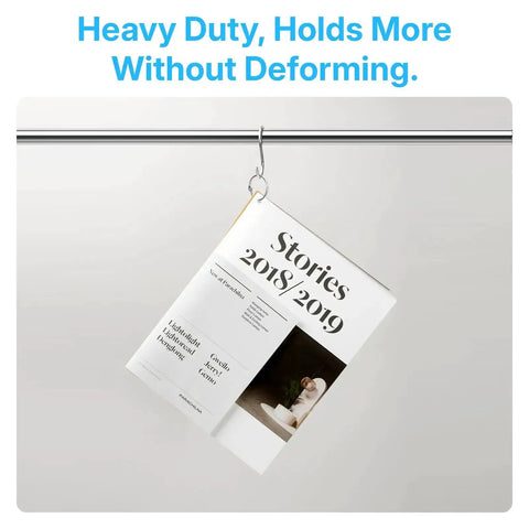 One Inch Binder Rings Set Of Fifty With Nickel Plated Metal Rings Includes Key Ring Clip And Hole Puncher holding booklet