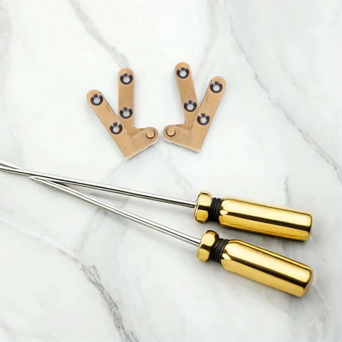 Hidden Door Pivot Hinges Two Pack Beefy Bronze Heavy Duty Horizontal Hardware with rust resistant brass construction on marble surface
