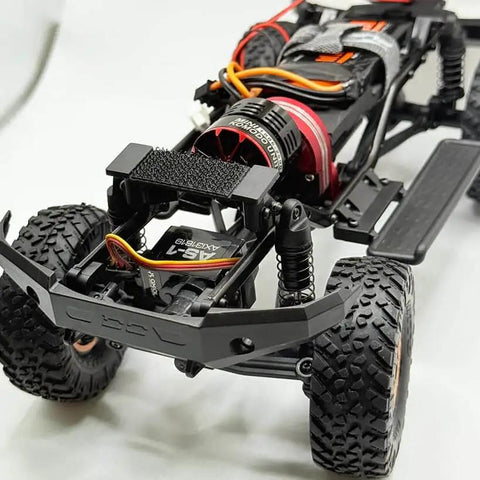 Close-up of 2 In 1 ESC And Motor Micro FOC Brushless System For Axial SCX24 And AX24 Upgrades installed in a 1/24 RC crawler frame.