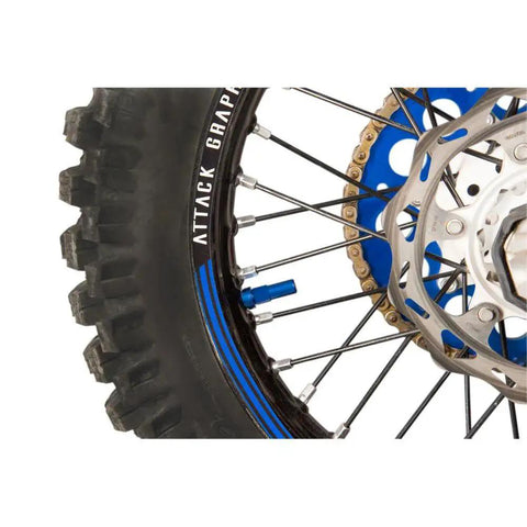 Close-up of Rim Lock Nut And Spacer Kit For Secure Off Road Wheel Mounting Aluminum Blue on dirt bike wheel