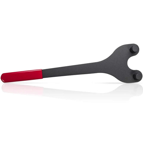 E-cowlboy cam pulley holder side view; metal tool with red handle and forked end with two pins.