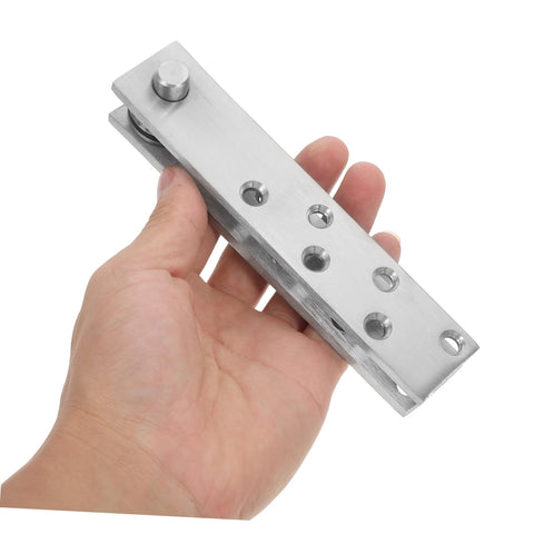 Person holding Hidden Door Pivot Hinges For Bookcases And Cabinets Heavy Duty Stainless Steel System