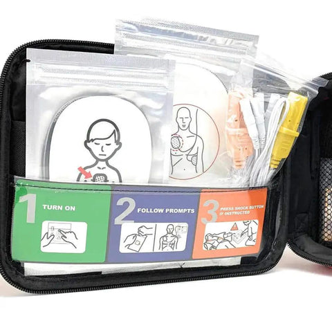 AED Defibrillator Practi Trainer Essentials Base Model Training Kit With Reusable Adult And Child Pads in open carry case