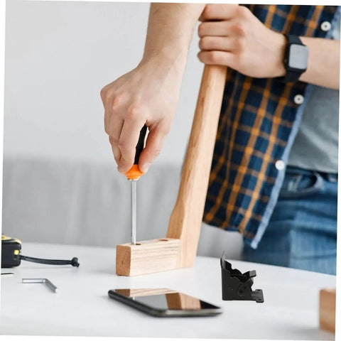 Person assembling furniture using Heavy Duty Folding Hinges for Table Legs and Chairs 2 Pack Spring Hinges Easy to Install.