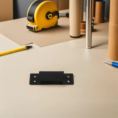 Hidden 5 Inch Black Concealed Wood Door Hinges for Secret Doors and Bookcases on a desk with tools