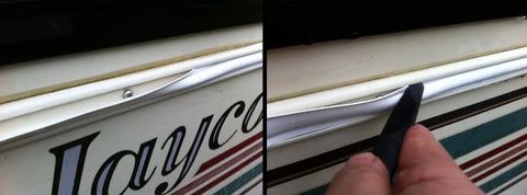 White Vinyl 7/8 Insertion Trim Screw Cover For RV Camper Travel Trailer 35 ft being applied to RV exterior.