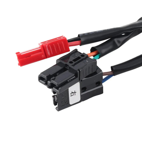 Electric wheelchair power controller module in black plastic with wiring harness and red two-pin connector.