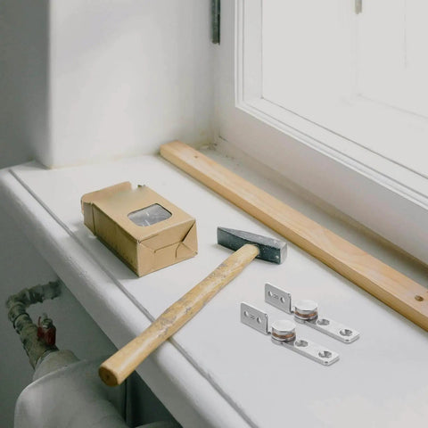 Heavy Duty 90 Degree Torque Hinge Set For Cabinets And Doors SOLUSTRE Stainless Steel shown with installation tools on window sill.