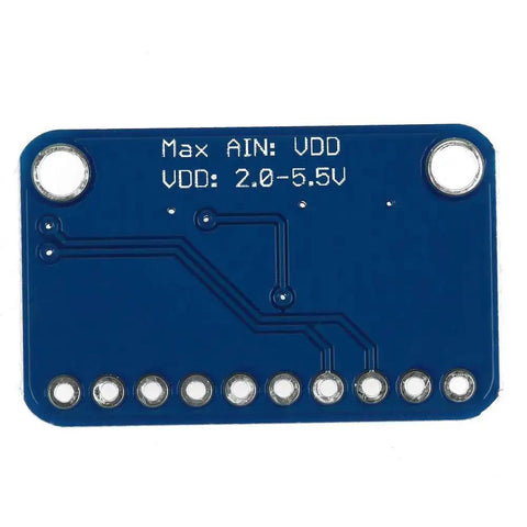 Rear view of 16-Bit I2C ADC Development Board For Microcontrollers showing soldered pins and VDD voltage details.