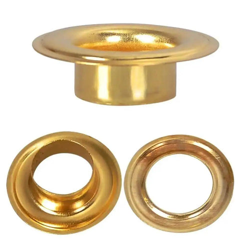 Three gold grommets from the All In One Grab And Go Eyelet Grommet Pliers Kit With 1 Hole Punch And 100 Gold Grommets for crafts.