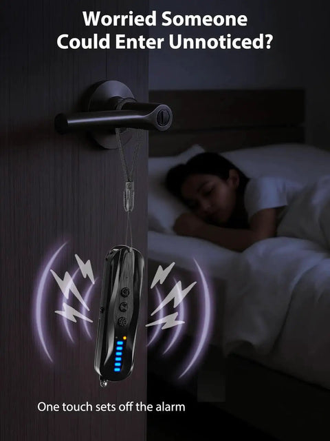 Infrared Pin Hole Camera Finder And Wireless Detector hanging on door handle near sleeping person, showing alarm activation.