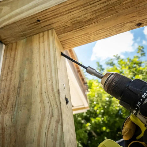 Installing 5/16 Inch By 6 Inch Heavy Duty Structural Screw With Dual Drive Power Hex And Washer Star Drive Head into wooden post