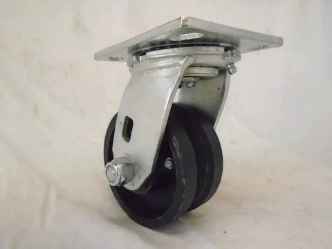 Side view of Swivel Caster 4 By 2 Inch With 7/8 Inch V Groove Iron Steel Wheel 600 Lb Capacity showing top plate and bolt pattern.
