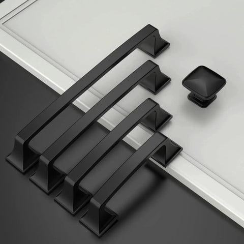 10 Pack Matte Black 3 Inch Hole Centers Cabinet Pulls Solid Zinc Alloy Kitchen Drawer Handles arranged on a surface