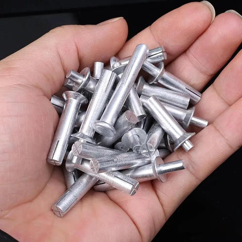 10pcs Hammer Drive Expansion Rivet Aluminum Alloy Nail Head Screws 6.4x23mm in a hand, showcasing durable construction