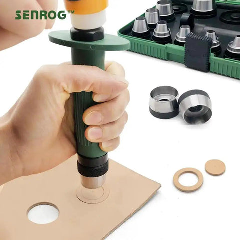 12 In 1 Gasket Punch Set being used to punch a hole in leather, with hollow punches and handle, storage box visible in background