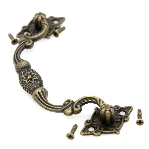 4 Pack Vintage Antique Brass Bail Pull Handles For Wooden Drawers Cabinets And Cupboards, showing one handle with screws.
