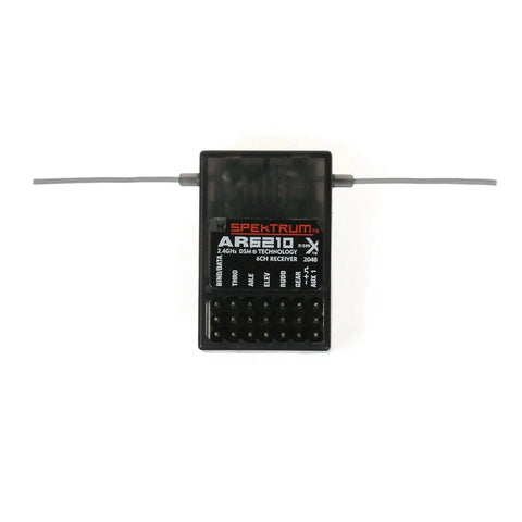 Ar6210X DSMX 6 Channel RC Receiver built to work with JR and Spektrum transmitters, shown front view with dual antennas