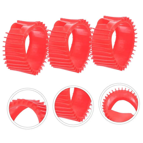 Five red silicone gauge protector sleeves with ribbed exterior