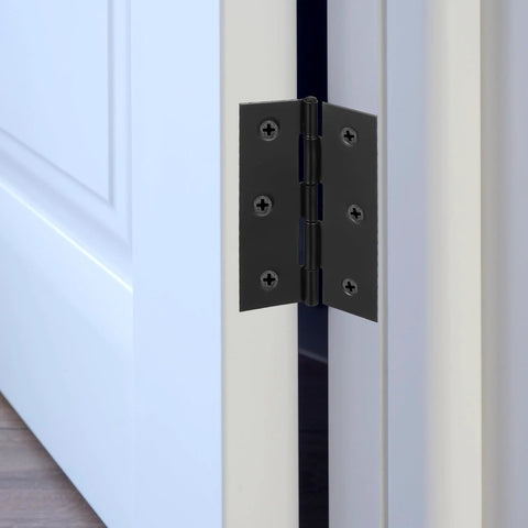 2 Pcs 3-inch black stainless folding door hinges with screws, installed on door edge