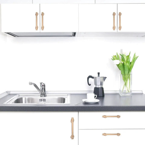 Installed 5 Inch Center-To-Center Champagne Bronze Cabinet Pulls, showcasing 6.2 Inch Length, gold hardware in modern kitchen setting.