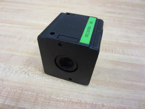 Hydraulic filter housing (glass bowl missing) Part 0821303500 showing a black cube design on a wooden surface