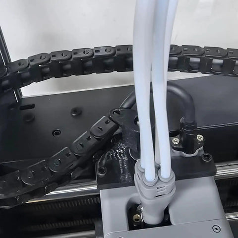 Installed Drag Chain Replacement Kit For FlashForge Adventurer AD5X with black cable track and white wires on 3D printer