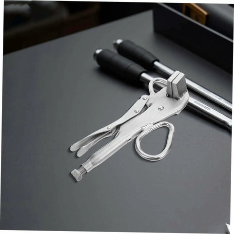Adjustable Auto Body Sheet Metal Clamp Pliers with beefy wide flat duckbill jaws on a gray surface for precise welding and vehicle maintenance.