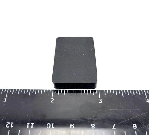 Rectangle Silicone Rubber Bumper Feet One And One Half Inch By One Inch Three Sixteenth Inch Thick with ruler for size reference