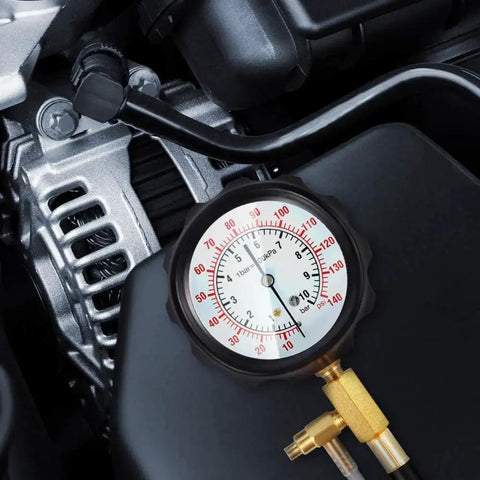 Fuel Injector Pressure Tester Gauge Kit 0 To 140 PSI With Adapters And Fittings attached to engine
