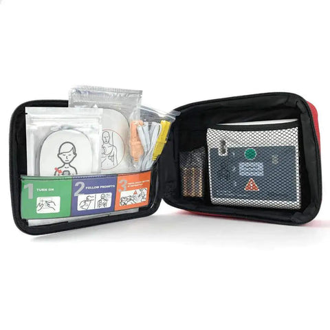 Practi Trainer Essentials AED Training Kit Base Model with reusable adult and child pads in open carrying case for CPR practice