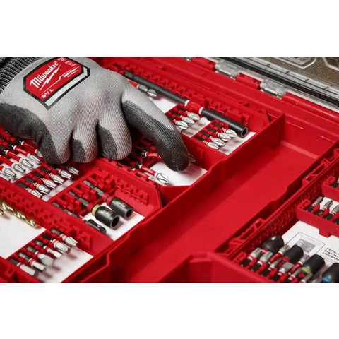 Shockwave Impact Duty Driver Bit Set 80 Piece With Wear Guard Tip And Optimized Shock Zone For Maximum Torque And Long Life Made From Custom Alloy76 Steel For Superior Durability And Tough Jobs Milwaukee open case with gloved hand selecting bit