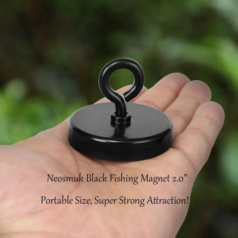 Heavy Duty Fishing Magnet 2 Inch Eyebolt Neodymium 350 Pound Lifting Handle resting on a hand, black finish.