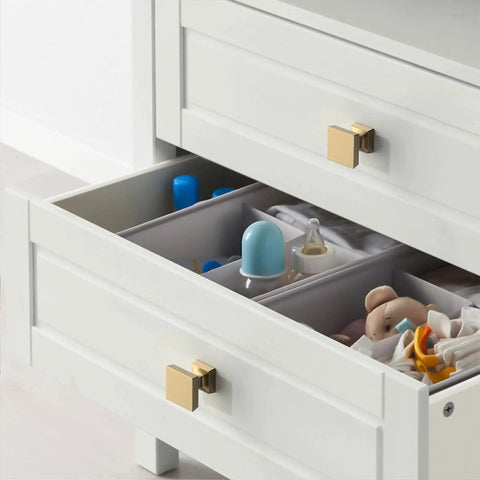 Champagne Bronze Cabinet Knobs Set 10 Pack 1.2 Inch 30mm Single Hole Drawer Knobs installed on a white cabinet ZH0008