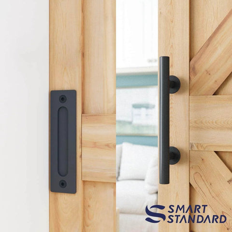 Close-up of wooden door with black pull handle from 5 Foot Top Mount Sliding Barn Door Hardware Kit With Pull Handle And Floor Guide Fits 30 Inch Wide Door Panel T Shape Hanger DIY Friendly Easy To Install Premium Quality.