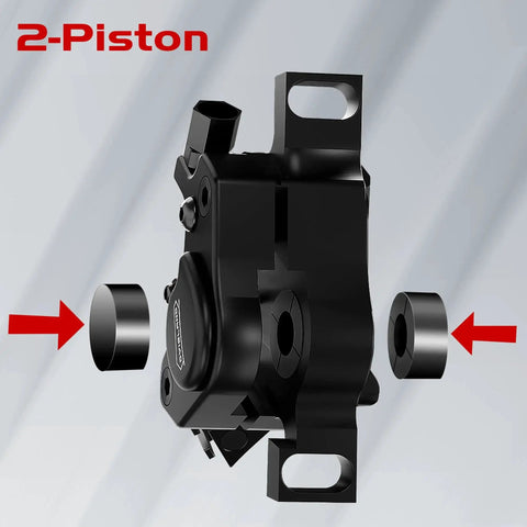 DYISLAND XT-7 hydraulic disc brake caliper, black, side view with mounting tabs and spacer bushings
