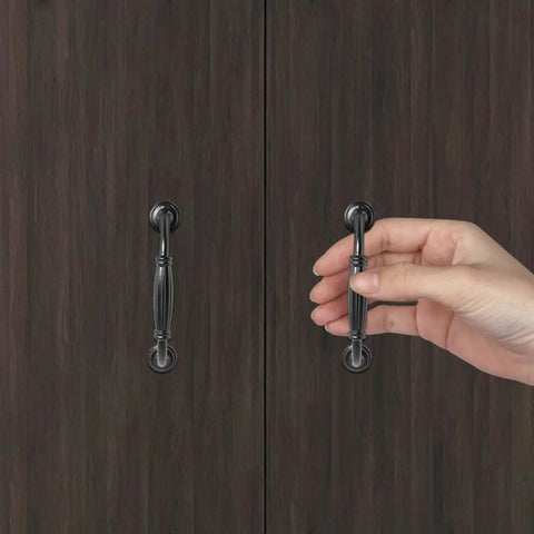 Black Cabinet Handles Set, 3 3/4 Inch Hole Center (96mm), being installed on dark wooden cabinet door.