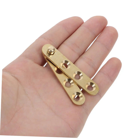 Copper Pivot Hidden Door Hinges 4 Piece Set For Cabinets And Bookcases Built To Last Heavy Duty Invisible Door Hardware shown in hand