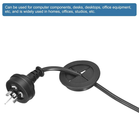Two Pack 32mm Desk Grommets Flexible Rubber Cable Pass Through Hole Covers in matte black with power cord, for office organization.