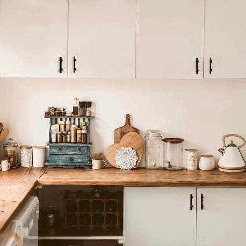 Kitchen cabinets with 30 Pack 5 Inch Matte Black Cabinet Pulls With Round Base For Kitchen Cabinets And Drawer Fronts, 3 Inch Center to Center Hole Spacing, Durable Metal Handles With Sleek Contemporary Design installed.