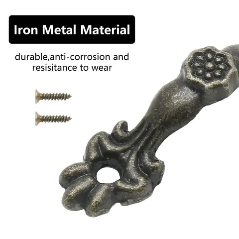 Close-up of vintage-style drawer pull in bronze finish, showing floral design and mounting screws, part of 24 Pcs set, zinc alloy.