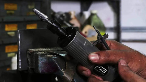 Close-up of Carbide Ball End Double Cut Burr for Die Grinder, Three Quarters Inch Diameter in use