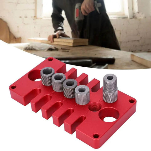 Punch Positioner Dowel Jig 3-In-1 Drill Guide Block for Woodworking shown in red aluminum with positioning holes