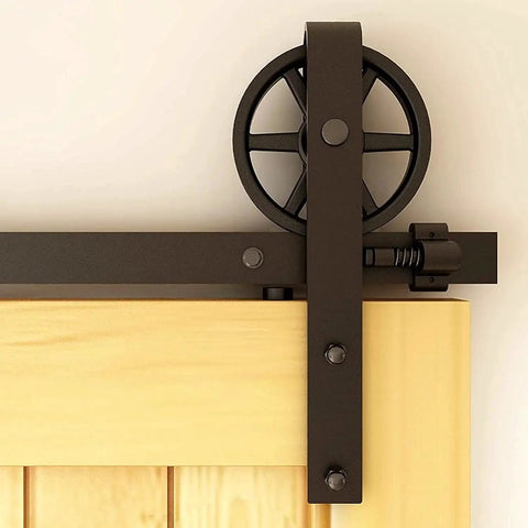 Close-up of heavy duty steel roller on 20Ft Heavy Duty Sliding Barn Door Hardware Kit For Smooth Quiet Operation With Big Spoke Wheel Hanger J Style Fits 120 Inch Door Panel Solid Steel Roller And High Strength Flat Tracks Supports Up To 150Kg Durable Anti Corrosion Construction.