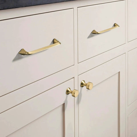 Champagne Bronze Cabinet Knobs 10 Pack Modern Drawer Pulls for kitchen cabinets, shown installed on white cabinets.