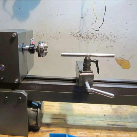 MT-2 Morse taper drill chuck adapter, side view, on a metal lathe with tailstock.